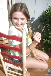 Next Door Kitty Burning A Cigarette And Displays Her Panties