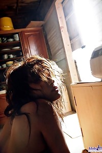 Breathtaking Asian Siren Presents Off Her Delectable Tits And Hairy Cunt In A Cabin On The Sandy Beach