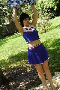 Take A Look At This Excited Cheerleader As She Undressed In The Public And Rubs Her Clit In This Porn